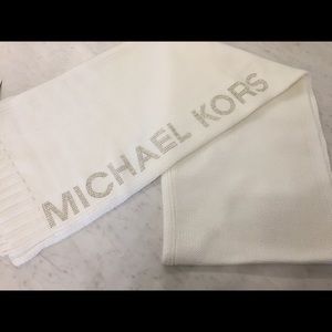 Brand new tags on Michael Kors scarf.